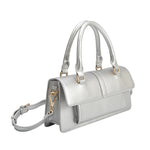 A small silver metallic vegan leather rectangle shaped top handle bag.