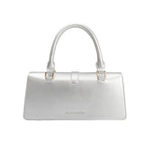 A small silver metallic vegan leather rectangle shaped top handle bag.